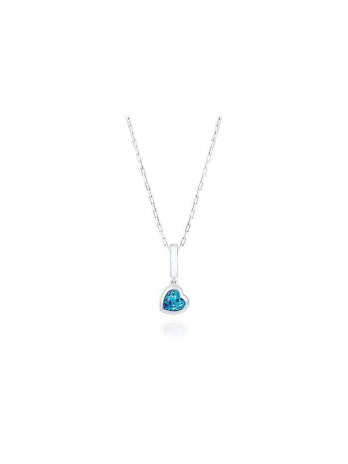 Our ‘Tradition with a twist’ charm with a heart Ostro Blue Topaz set in Sterling Silver on a silver necklace