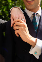 Load image into Gallery viewer, A modern couple wearing their ‘Hidden Gem’ Sterling Silver rings for him and her as well as our ‘off the Cuff’ octagon cufflinks with a pair of Octagon Ostro Blue Topaz set in sterling silver
