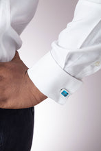 Load image into Gallery viewer, ‘Off the Cuff’ Octagon Cufflinks with a pair of Octagon Ostro Blue Topaz set in sterling silver being worn by model

