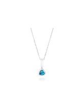 Load image into Gallery viewer, Our ‘Tradition with a twist’ charm with a heart Ostro Blue Topaz set in Sterling Silver on a silver necklace
